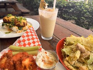 Wings, Krabby cakes, Pina colada, caesar salad! Everything is so crispy, so delicious. If I lived in hawai’i this would be somewhere I’d come every day!  at 9th Island in Haleiwa
