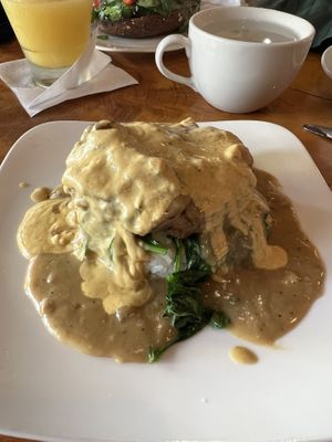 Mocko Loco made with Beyond burger, mushrooms, spinach and onions, with homemade brown sauce and vegan hollandaise sauce.   at 9th Island in Haleiwa