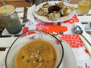 kefir water, cocoa & avocado & spirulina smoothie, watermelon & tomato gazpacho, Tibetan mono. yum!  at Rayen Vegano in Madrid