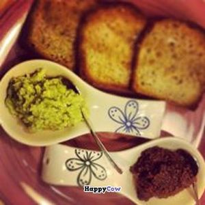 Breakfast: homemade bread, avocado and tapenade! at Rayen Vegano in Madrid