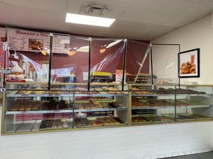 Top 2 rows are vegan. Go crazy my friends!! at Ronald's Donuts in Las Vegas