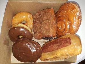 Glazed, chocolate glazed, Boston cream, apple turnover, fakin/maple, and cinnamon bun at Ronald's Donuts in Las Vegas