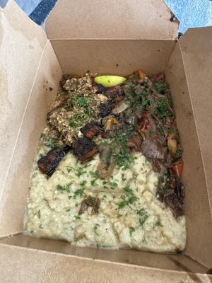 Mushroom plater with mash potatoes instead of ricee  at A Lo Vegano Orlando in Orlando