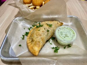 Chick’n and potato empanada - delicious!  at A Lo Vegano Orlando in Orlando