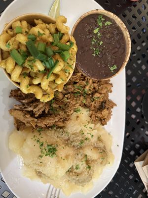 Mojo pork, black beans, yucca, Mac and cheese  at A Lo Vegano Orlando in Orlando