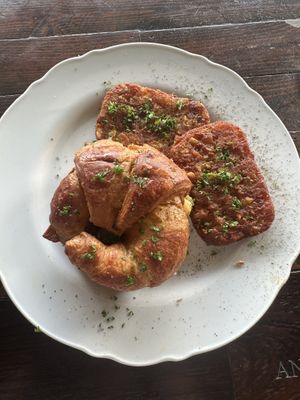 Croissant breakfast with a side of hash browns   at A Lo Vegano Orlando in Orlando