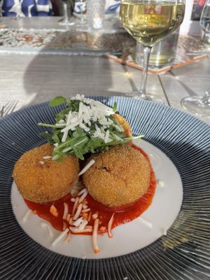 Arancini with vegan cheese, smoked red pepper & basil  at Wineport Lodge in Glasson