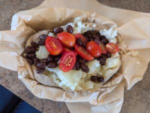 Baked potato with tomatoes and black beans at Idaho Potato Museum & Potato Station Cafe in Blackfoot