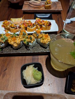 Monterey Roll (front), Half Moon Roll (back), Shiso Shrub Mocktail (right). at Tane Vegan Izakaya in Palo Alto