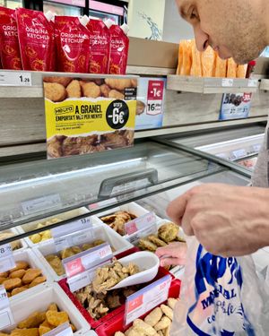 Buying our favorite frozen bocados by Heura. In La Sirena, two types of frozen vegan products by Heura are always available in bulk—bocados and nuggets. We even caught a discount at La Sirena in Premia De Mar
