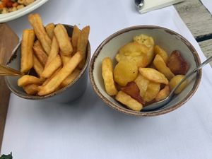 Friet of gebakken aardappelen geserveerd met gerechten   at Van der Valk in Molenhoek