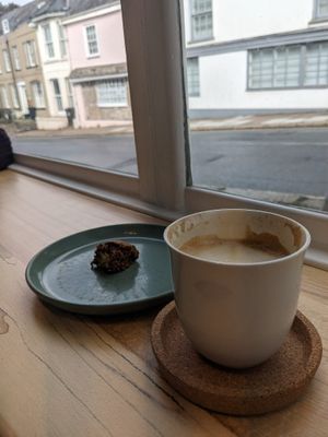 Latte and cookie which we ate before photographing!  at Tempt in Totnes