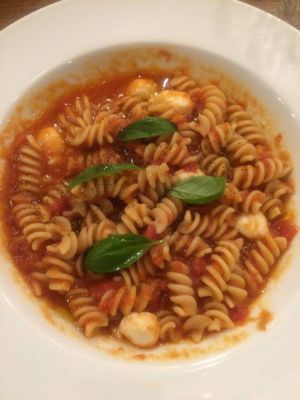 Pasta with tomato sauce and their own mozzarella-style cheese at CHOICE in Kyoto