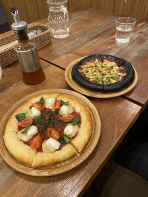 Vegan margarita and Charcoal pizzas  at CHOICE in Kyoto