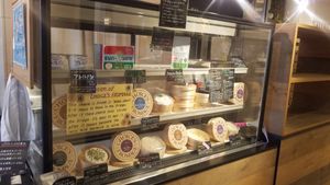 vegan cheese, butter, and yogurt case at CHOICE in Kyoto