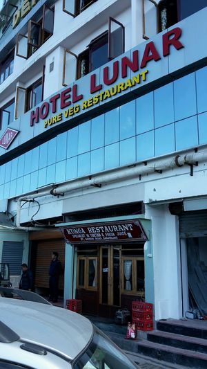 at street level take the steep stairs at left at Lunar Restaurant in Darjeeling