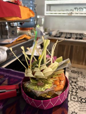 Her beautiful ritual (sometimes they close because of their ritual and you will only see that they are closed if you get there😅)  at Vegan Soul Cafe in Penida Island