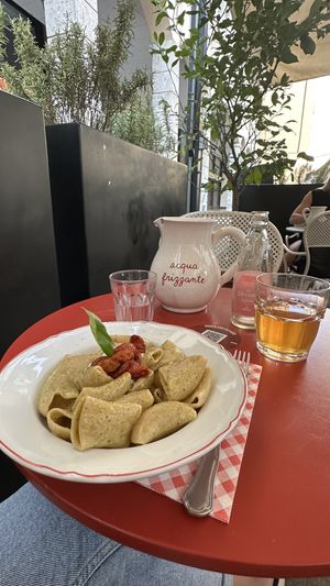 Paccheri with pistachios pesto, confit cherry tomatoes, plant-based stracciatella and pepper  at Mi Scusi in Bergamo