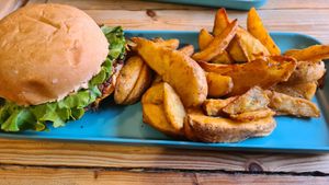 Double Smack burger with potato wedges at Hank Cuisine Végétale - Archives in Paris