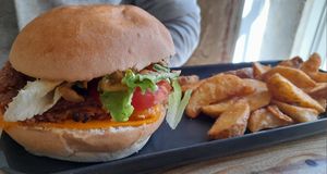 Double smack burger and potato wedges at Hank Cuisine Végétale - Archives in Paris