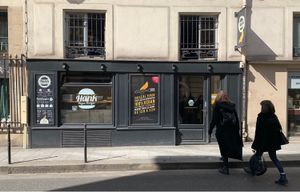 Whilst not the most inviting of shop fronts, their burgers are yum!! at Hank Cuisine Végétale - Archives in Paris