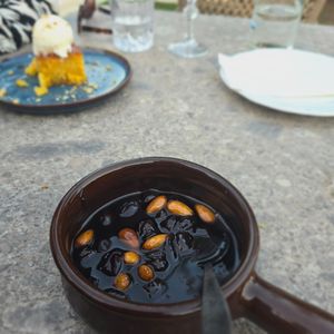 Bonus vegan desert stewed grapes and almonds. at Zefki Leeda's Slow Living Restaurant in Zakynthos
