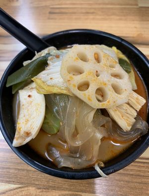 Hotpot with various bean curd, noodles, mushrooms and vegetables.   at Yangguofu Malatang   in Brussels