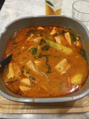 Tomato sweet and sour soup base.  at Yangguofu Malatang   in Brussels