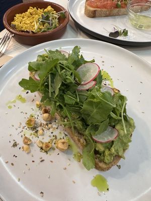 AVO toast + tofu scrambled + tomato toast  at Let It Bloom in Valencia