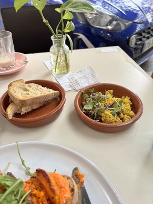Sourdough and scrambled tofu   at Let It Bloom in Valencia