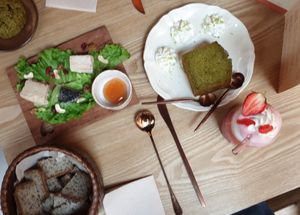Vegan cheese plate, cake and a strawberry milkshake. at Wassaï in Lyon