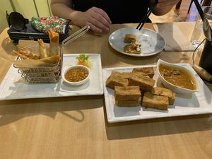 Kumara curry rolls, and crispy tofu with satay   at Sunflower Thai Vegetarian Restaurant in Auckland