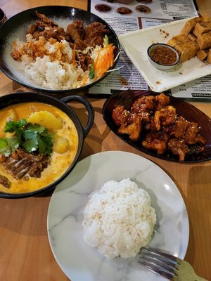 Massaman Curry with rice, Crispy Cauliflower, Salt and Pepper Tofu (with plum and peanut sauce) and the crispy chicken (really nice) at Sunflower Thai Vegetarian Restaurant in Auckland
