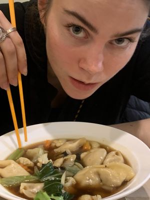 Liv with her dumpling soup   at Sunflower Thai Vegetarian Restaurant in Auckland