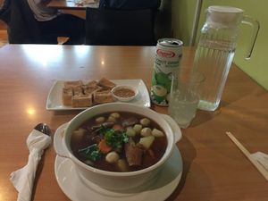 my dinner with Thai coconut drink at Sunflower Thai Vegetarian Restaurant in Auckland