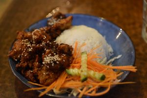 Spicy crispy chicken on rice at Sunflower Thai Vegetarian Restaurant in Auckland