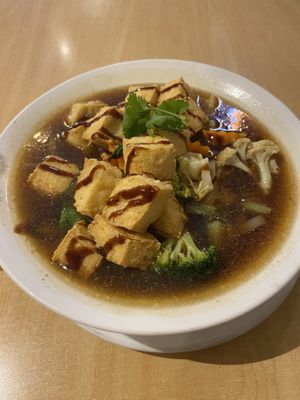 Rice noodle soup with crispy tofu   at Sunflower Thai Vegetarian Restaurant in Auckland