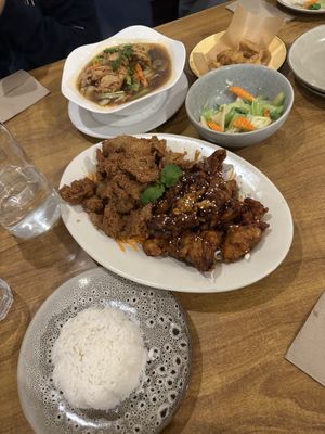 Vegan chicken platter, side of steamed veggies, noodle soup, and tofu.   at Sunflower Thai Vegetarian Restaurant in Auckland
