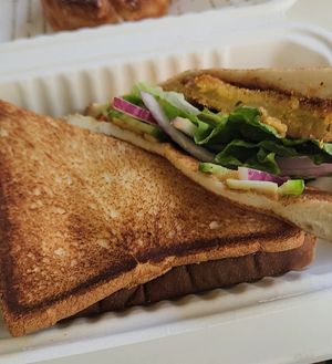 Fried green tomato sandwich on toast at La Tour Cafe - Nimitz Hwy in Honolulu
