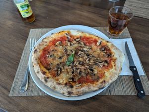 Pizza Funghi with vegan mozzarella at Ristorante Cosi  in Solothurn