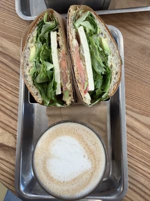 Sandwich + capuccino with oat milkk  at Plants By Us in Helsinki