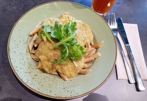 Whole wheat pasta with lentil carbonara sauce at Vegetaria in Vienna