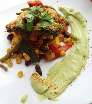 Polenta with mexican style grilled vegetables and avocado sauce at Vegetaria in Vienna