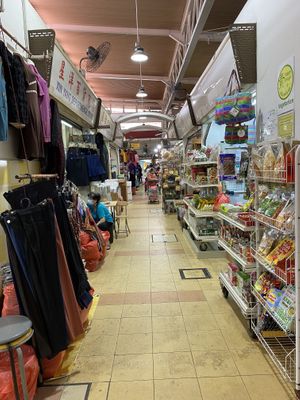 Located along the dry corridor separating the hawker centre and market stalls .  at Veggie Delight at JE254 in West Singapore