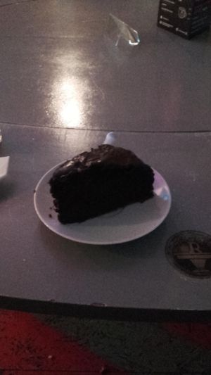 piece of a vegan chocolate cake at Klubokawiarnia Granda in Lodz