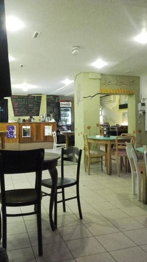 inside the restaurant. There are also coachs and so on. Really confortable place. at Klubokawiarnia Granda in Lodz