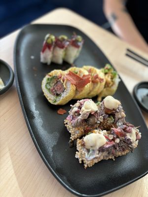 The middle sushi “Big M” was very reactive and I was surprised by how light it was!   at Sushi Momo in Toronto