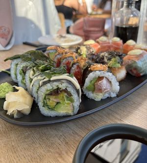 The roll in front - the Unami roll - is the best sushi roll I’ve ever had!   at Sushi Momo in Toronto