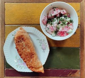 Cheburek: yeast-free dough, soy mince, homemade kimchi, onion, spices at Kruzhok in Yerevan