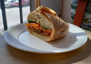 Banh Mi sandwich: sourdough bread, peanut sauce, our RostNoBeef, carrot and radish salad, cucumber, pickled onion, lettuce at Kruzhok in Yerevan